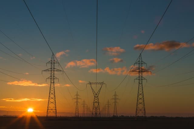 Electricity transmission infrastructure at sunset